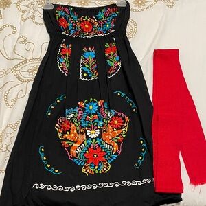 Colorful traditional Mexican Embroidered women’s dress. Handmade from Mexico